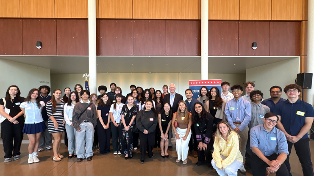 Rep. Thompson pictured with young alumni of his Student Leadership Council. 