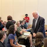 Rep. Thompson listens to a community member's concerns at a July 31st listening session at UC Davis on federal cuts to research funding. 