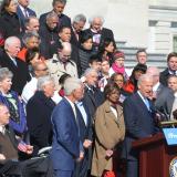 Rep. Thompson stands with Democrats while Vice President Biden addresses the crowd at the Capitol.