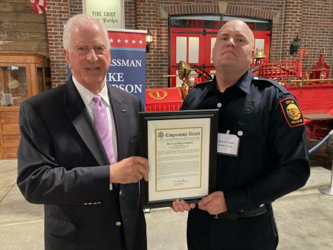Rep. Thompson presenting an award