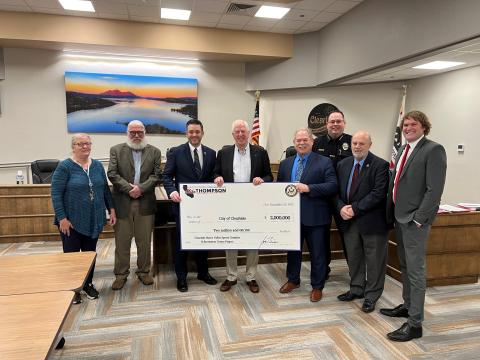 Thompson Presents Check