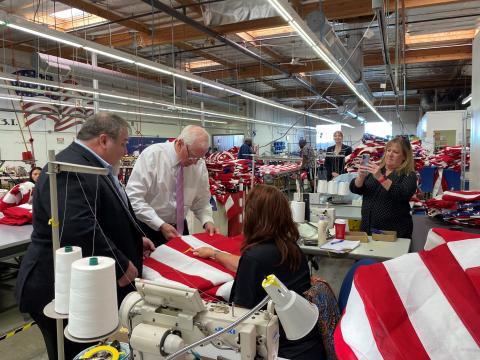 Rep. Thompson tours North Bay Industries and Examines an American Flag