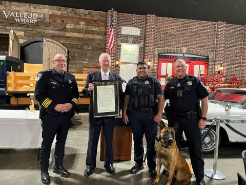 Rep. Thompson with Ghost and members of the Santa Rosa Police Department