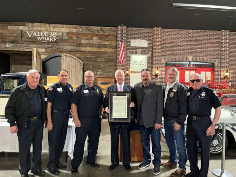 Rep. Thompson presents the Congressional Record Statement to the Clarksburg Fire Protection District