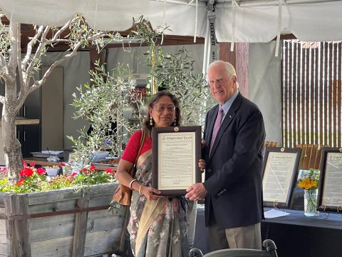 Rep. Mike Thompson presents CRS to Madhulika Singh 