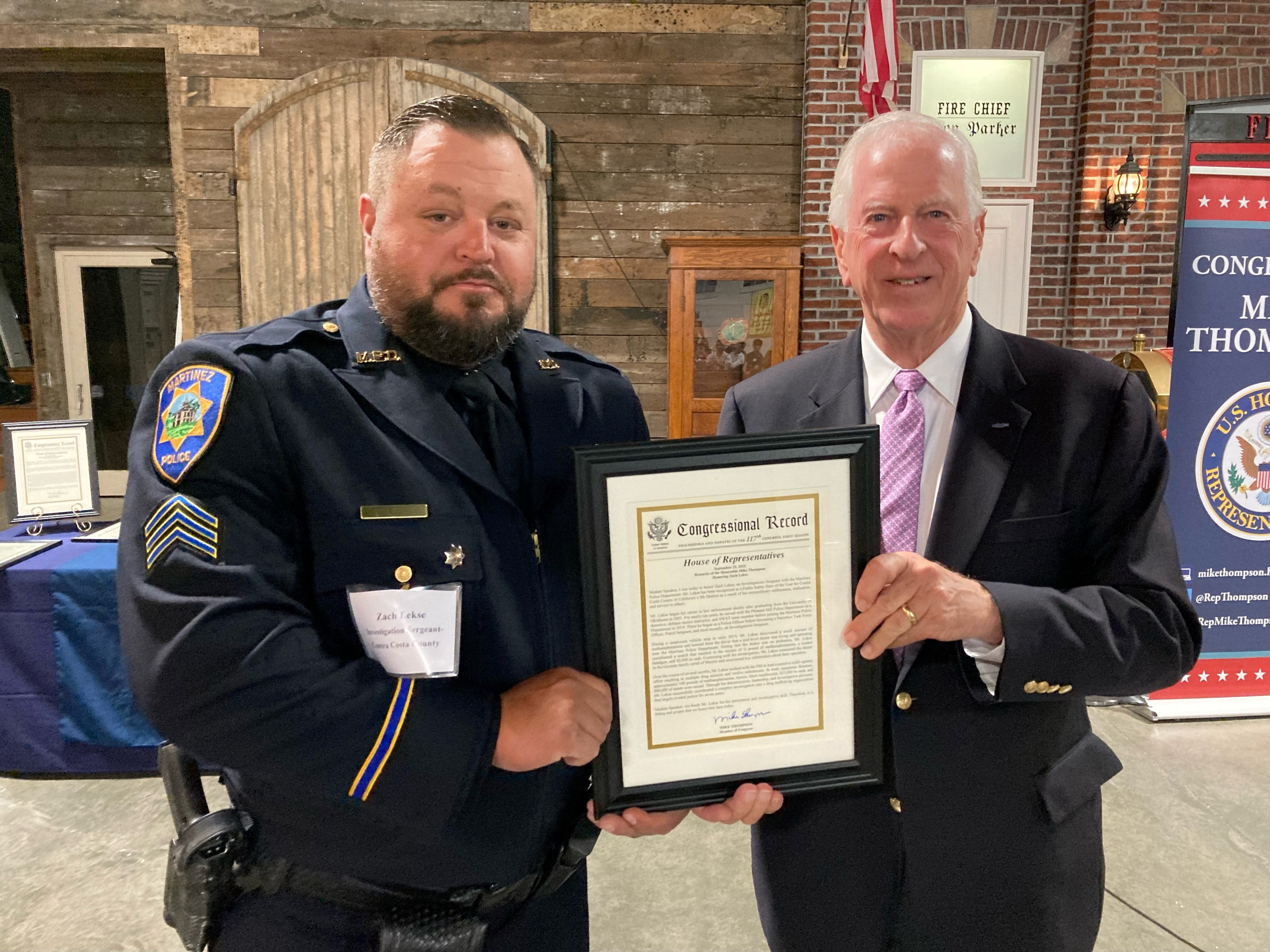 Rep. Thompson presenting an award