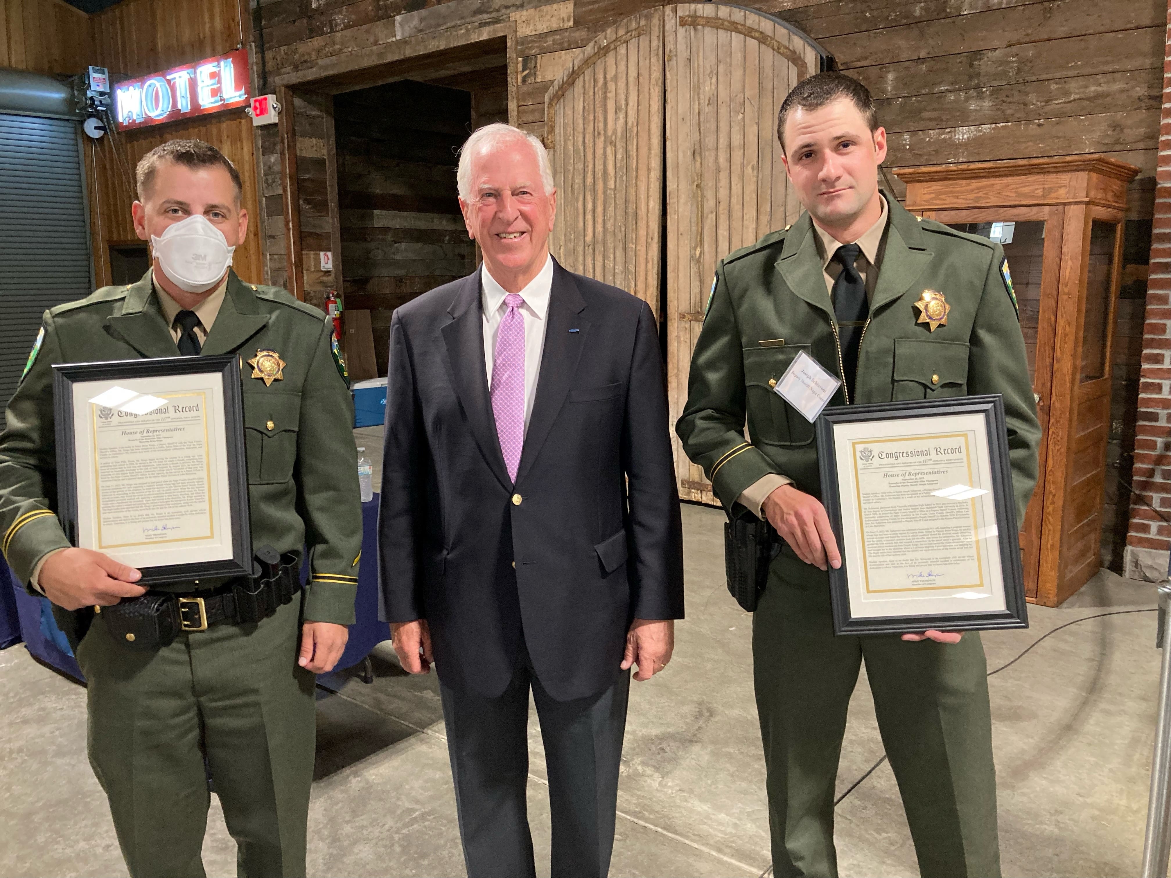 Rep. Thompson presenting an award