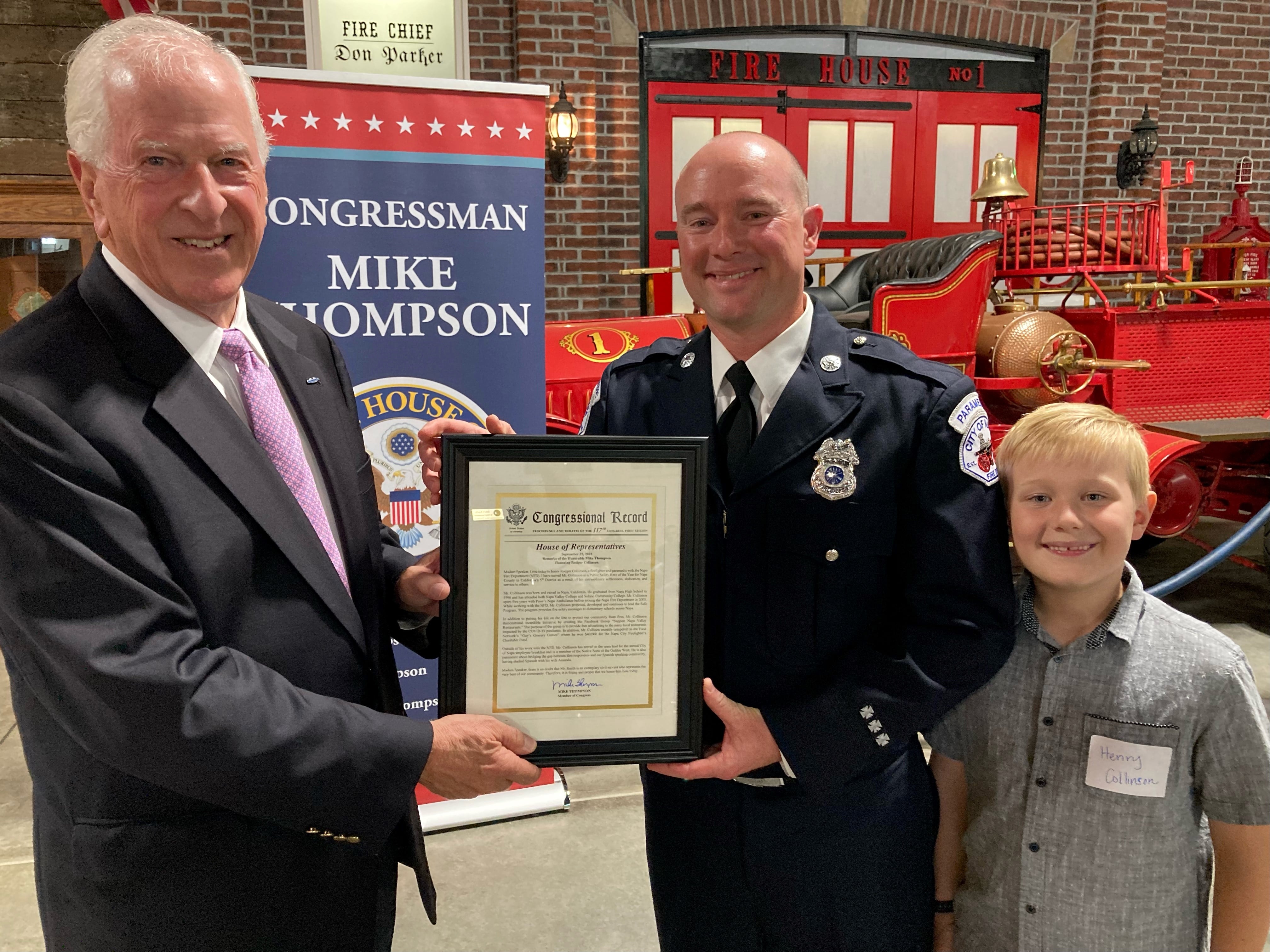Rep. Thompson presenting an award