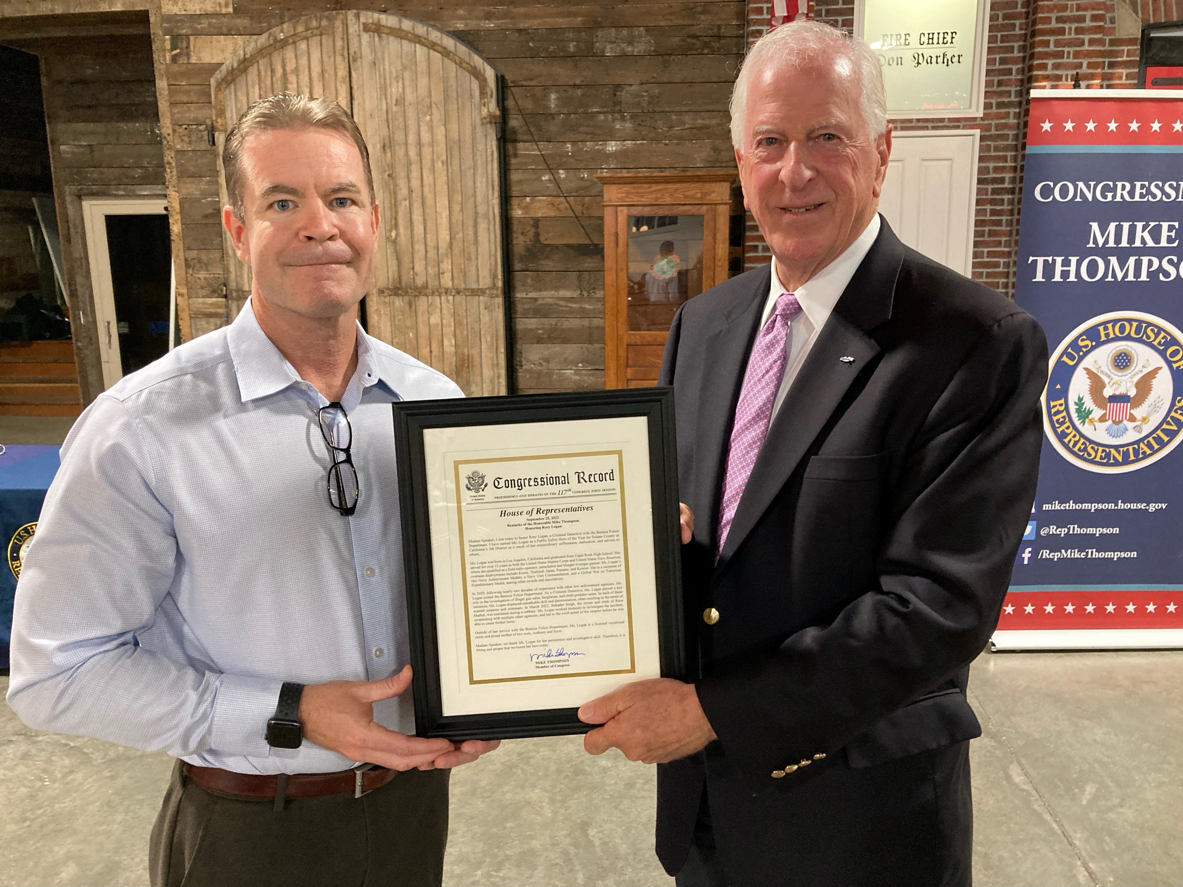 Rep. Thompson presenting an award