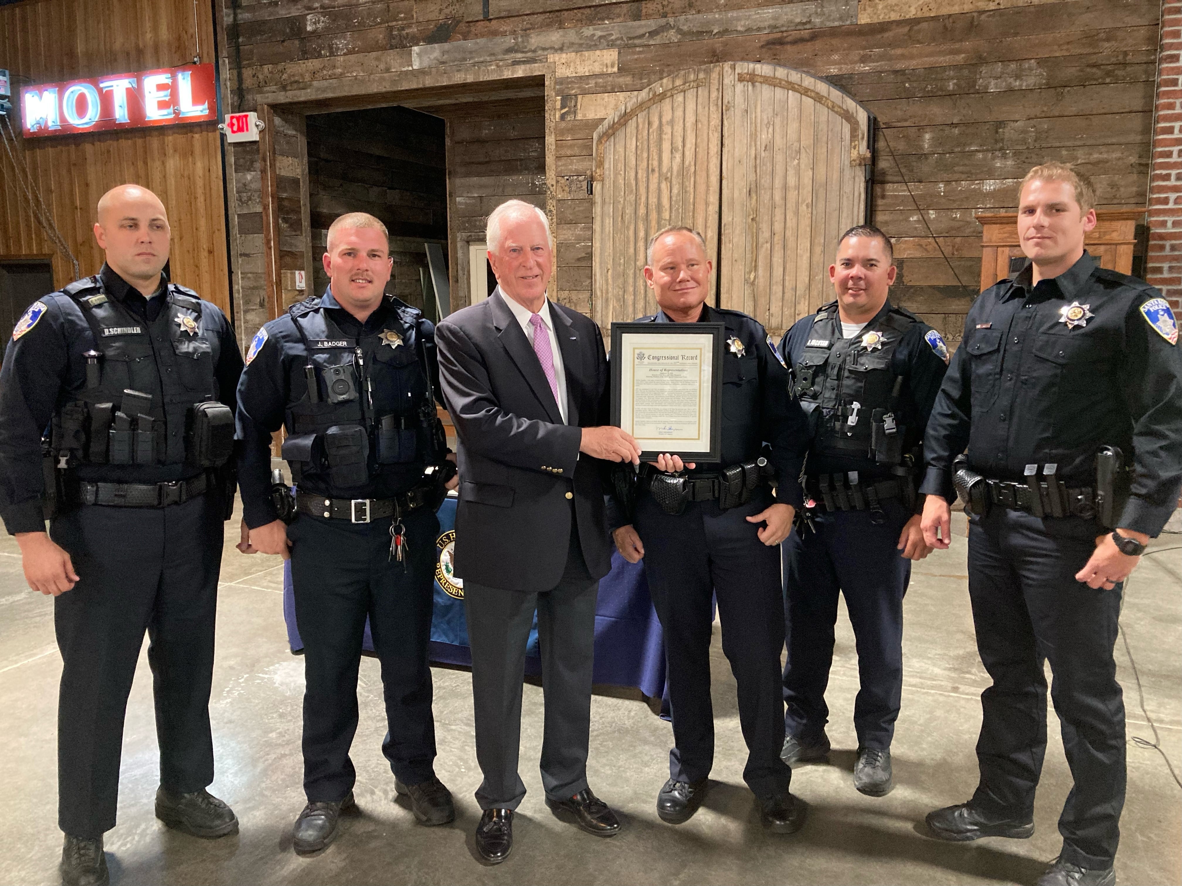 Rep. Thompson presenting an award