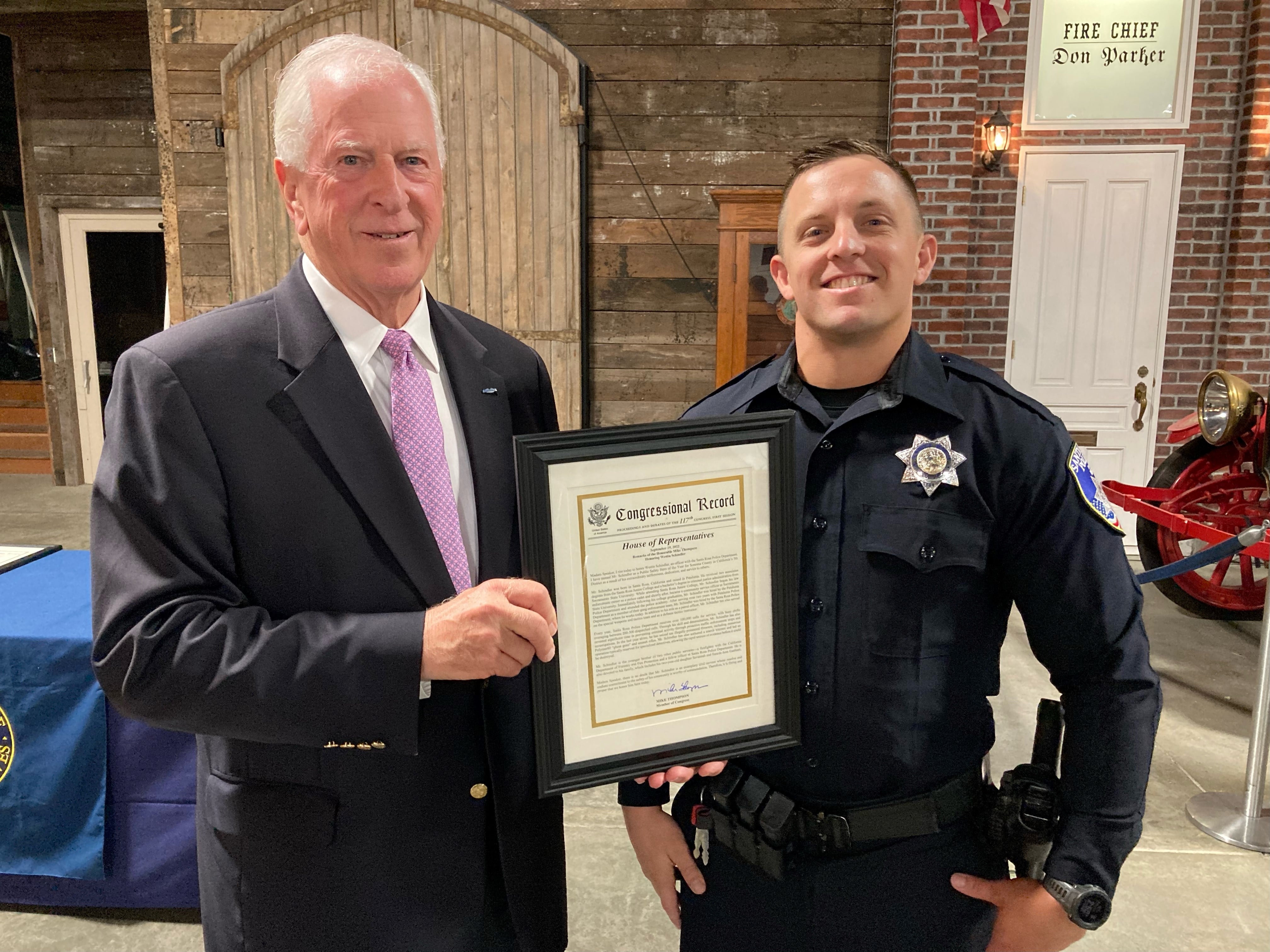 Rep. Thompson presenting an award