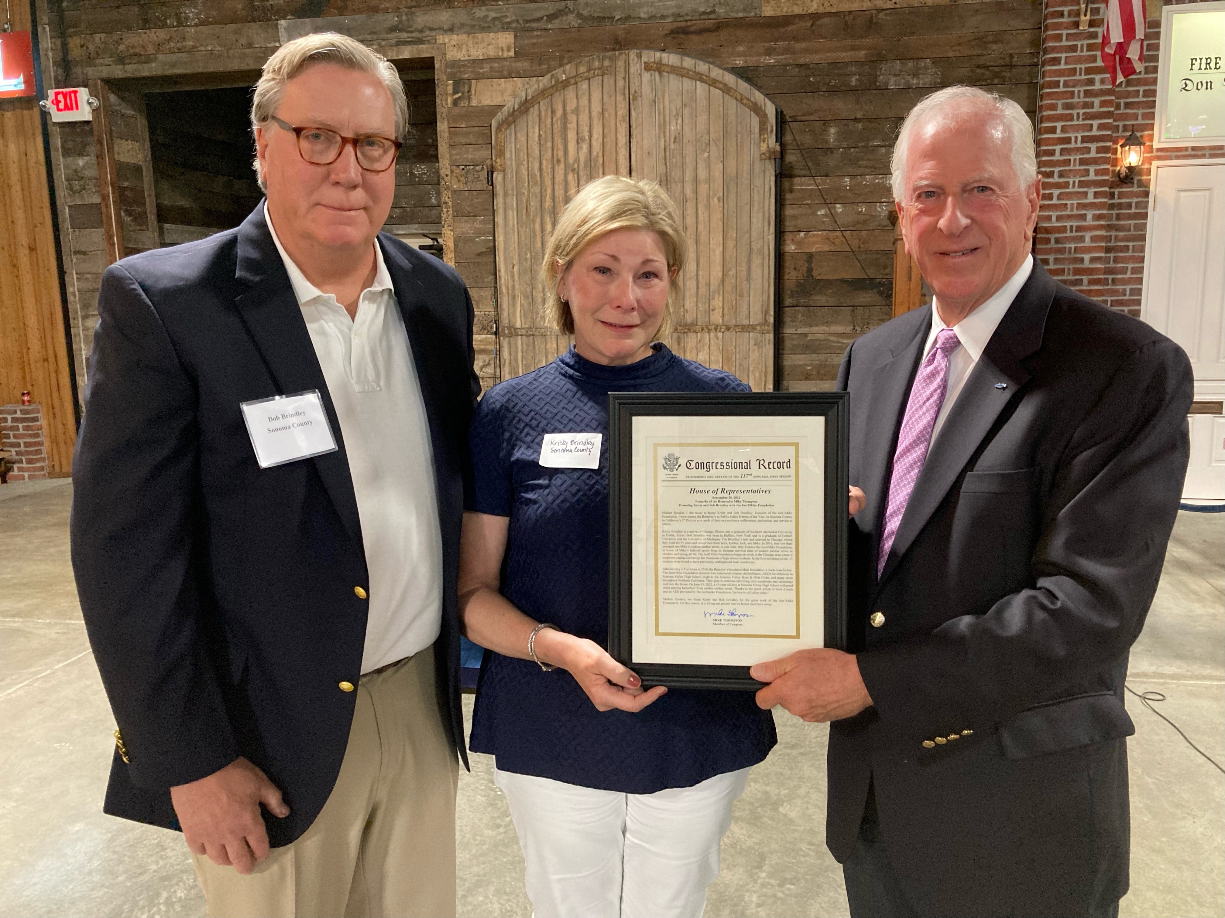 Rep. Thompson presenting an award