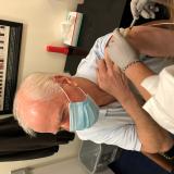 Photo of Thompson receiving COVID  19 vaccine